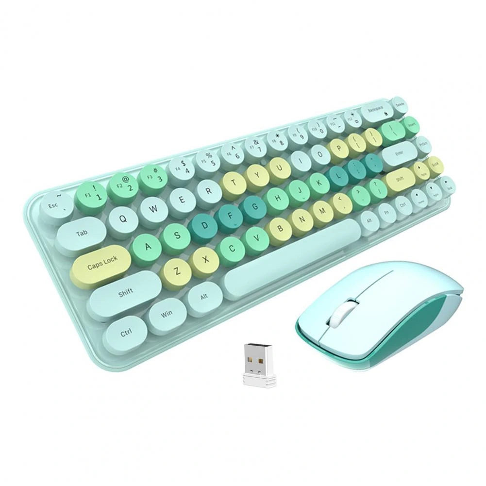 Wireless keyboard and mouse in pink on a desk